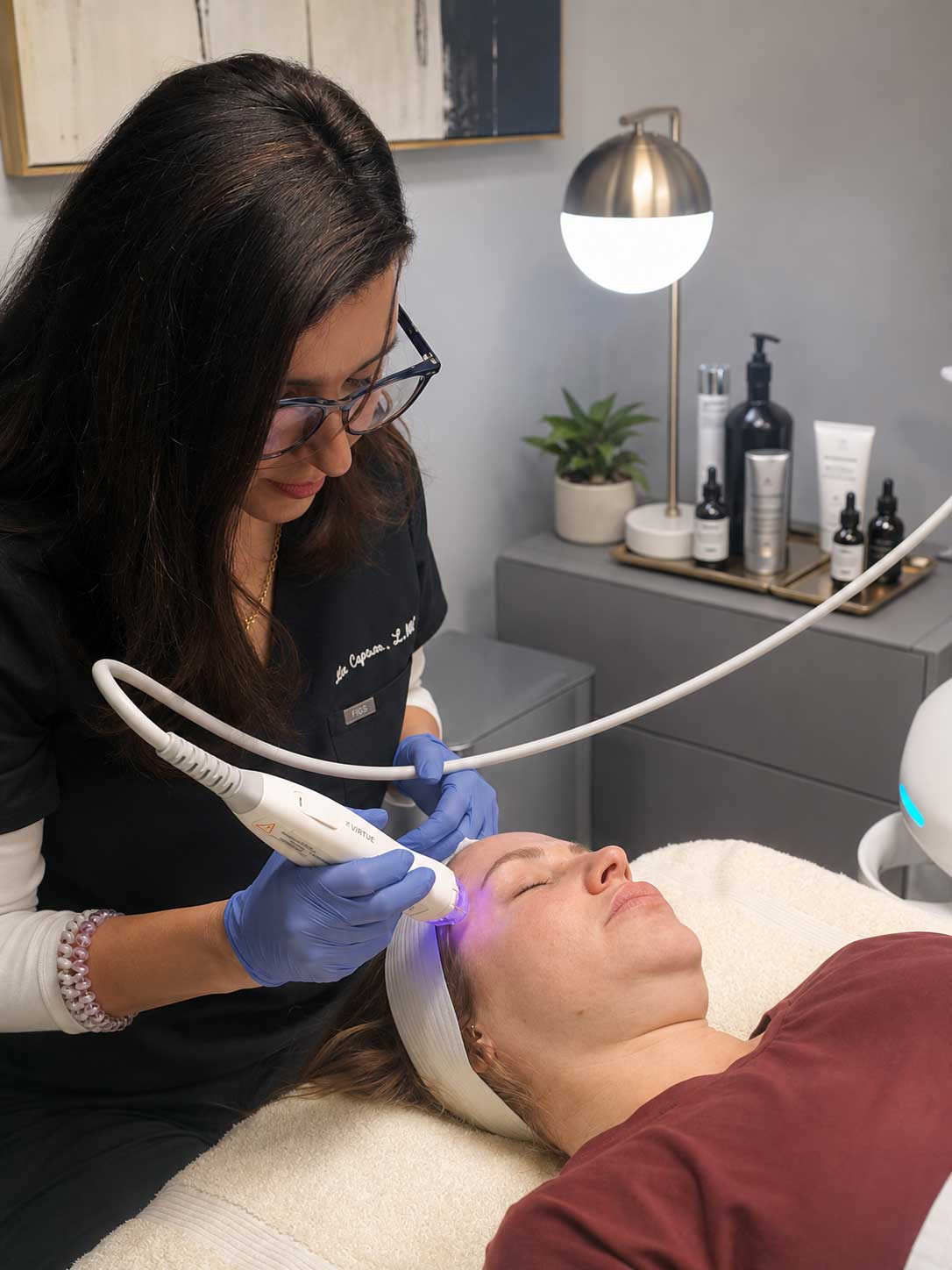 Nina Crytser performing Virtue RF microneedling treatment at Modern Skin Clinic in Charlotte NC